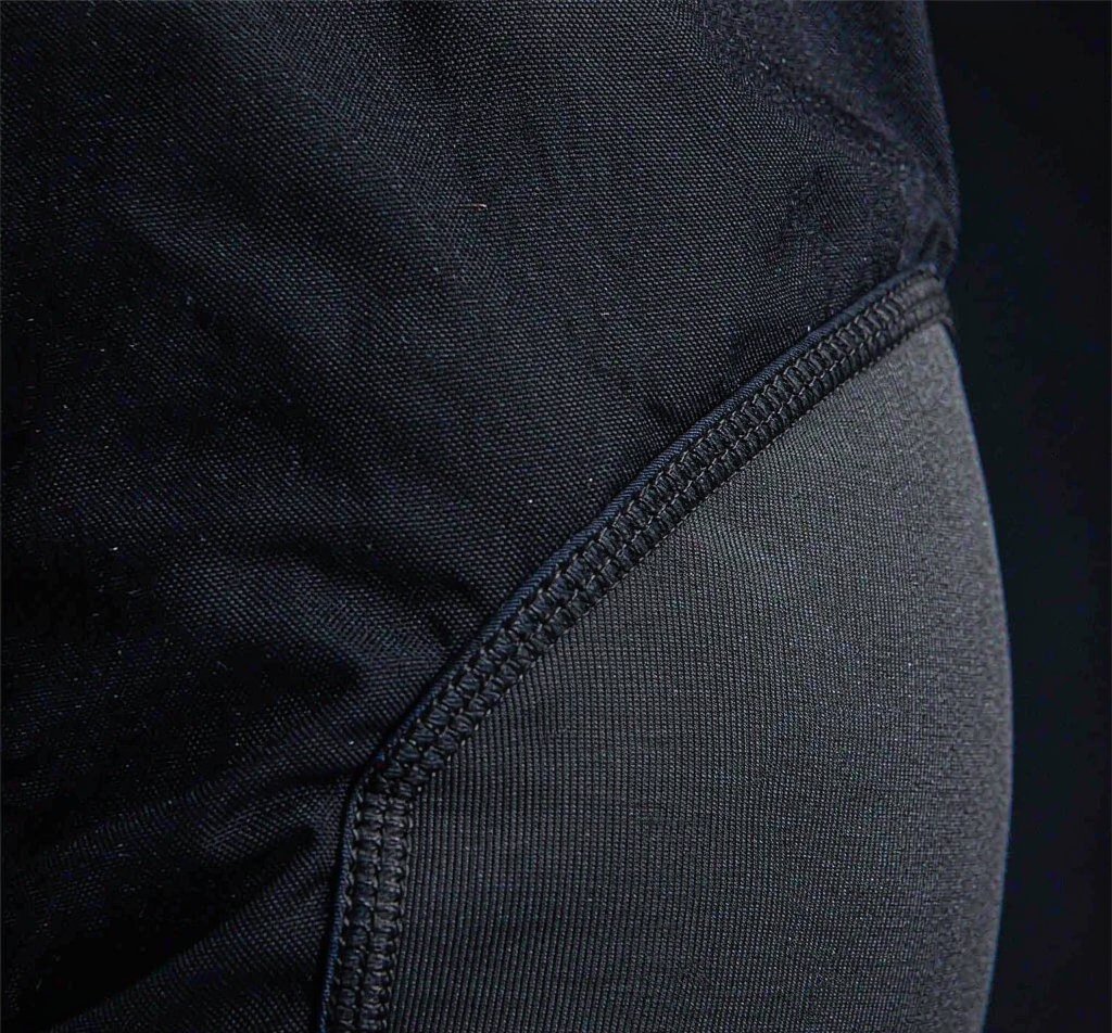 Abrasion-resistant twill shell with stretch panel