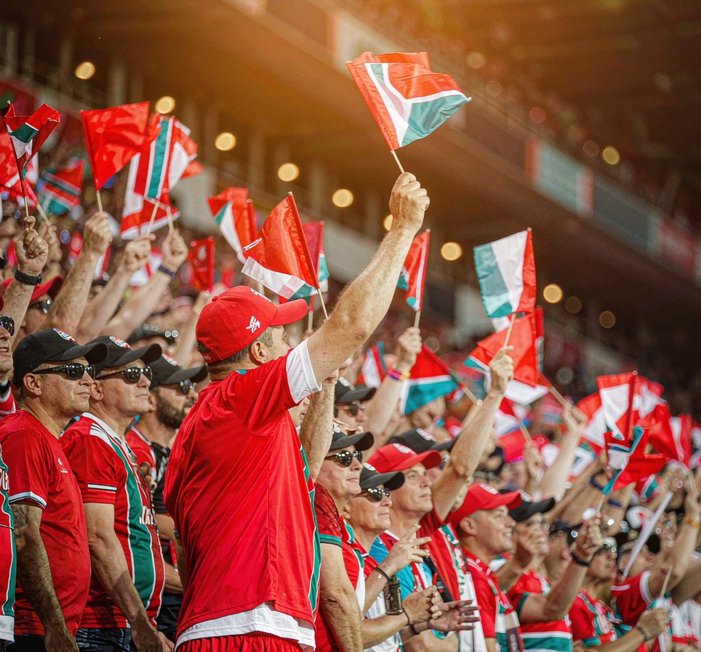 Hand-held supporter flags in the stands